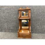 A late Victorian mahogany converted vanity mirror with bevelled glass back