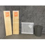 Pair of B & Q wooden bracket shelves, a radiator and a waste bin