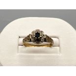 9ct gold diamond sapphire ring. 2.9g size O1/2