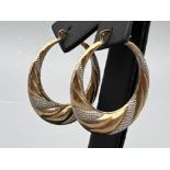 9ct gold two tone fancy hoop earrings. 1.5g