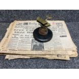 World War trench art in the form of an aeroplane and WWII newspapers