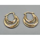 9ct gold fancy style hoop earrings. 1.3g