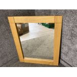 An oak framed contemporary wall mirror 90 x 73cm