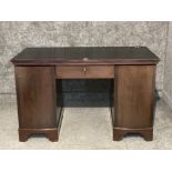A stained solid oak pedestal solicitors desk with key