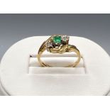 9ct gold diamond and emerald ring. Size N 2.4g