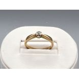 9ct gold diamond solitaire ring. 2.4g size O