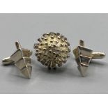 A silver starburst ring, 8.6g - size P, and a pair of white metal cufflinks 6.2g