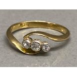 18ct gold 3 stone diamond crossover ring, size L, 2.1G