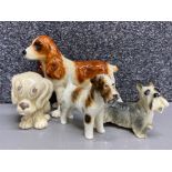 A Sylvac dog ornament plus 3 other dog figures