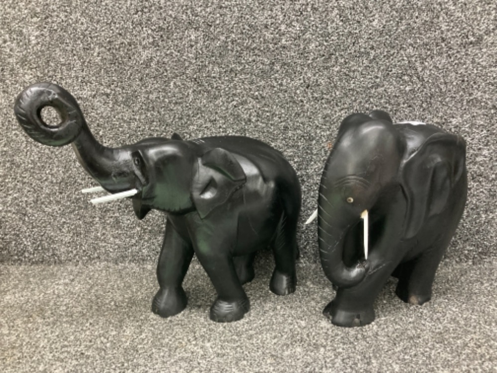 Two heavy carved wood elephants