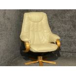 A cream leather stressless style swivel chair