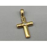 9ct gold diamond cross pendant. 0.7g