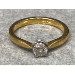 An 18ct yellow gold and diamond solitaire ring approx .25ct size P 3.6g gross