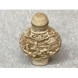 A Chinese snuff bottle with marks to base