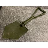 Green metal folding military trench shovel