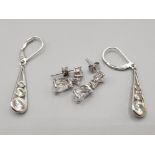 Two pairs of silver and CZ earrings