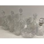 8 pieces of vintage crystal glass, includes a vase, jug & 6 decanters
