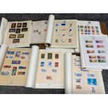 Large quantity of loose stamps from around the world, also includes 8x stamp albums