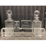 Two leaded crystal glass decanters with stoppers together with 5 Royal Caribbean international glass