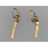 A pair of 18ct yellow gold earrings 2.5g