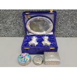 A vintage silver plated creut set in velvet case, and three metal trinkets one with cloisonne
