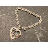 Silver 925 bracelet with guess heart shaped pendant, 14.3G