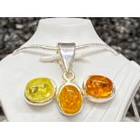 Silver & 3 stone faux amber pendant on 20” silver chain,