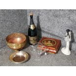 An empty champagne bottle, vintage metal tin, victorian plated bottle stand etc