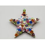 A Kirks Folly star brooch with applied crystals