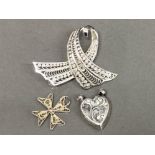 Silver filigree brooch & 2 silver pendants, 8.6g