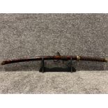A ornamental japanese katana (samari sword) that comes with original sword case and stand