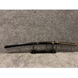 A ornamental japanese katana (samari sword) with original wood accents and stand