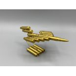Small plane model made out of brass bullet cases