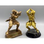 Two old samari figures with swords and stands