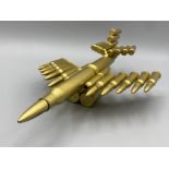 Large plane model made out of brass bullet caese