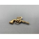 9ct Gold Revolver Gun Charm weighs 1.0g