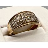 Ladies 9ct gold diamond turban style ring. 2.8g size N