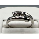 Ladies 9ct white gold 5 stone diamond ring. Featuring 5 round brilliant cut diamonds Chanel set.