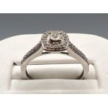 Ladies 9ct white gold diamond cluster halo ring. 2.3G size O