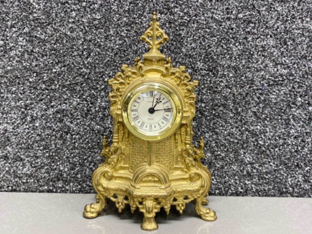 Italian brass reproduction Uranio Quartz mantle clock, in good working condition