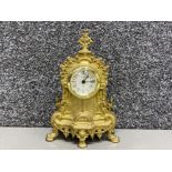 Italian brass reproduction Uranio Quartz mantle clock, in good working condition