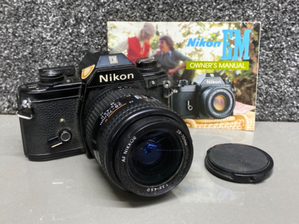 Nikon EM 35mm SLR camera with Nikon AF Nikkor lens 28-70mm, with owners manual