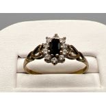 9ct gold sapphire and cz ring. 1.5g size S