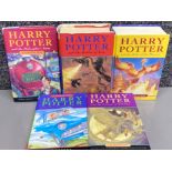 5 hardback Harry Potter books, includes the philosopher’s stone, the chamber of secrets, prisoner of