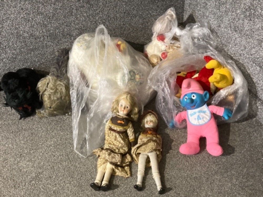 A quantity of soft toys and dolls to include Baby Smuf etc