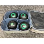 A set of four vintage boules size medium in fitted bag