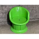 Green plastic child’s storage tub chair