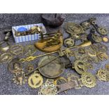 A box of brassware includes Horse brasses, scales, door stop, letter rack etc