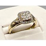 Ladies 9ct gold square cluster ring. Featuring 9 round brilliant cut diamonds surrounded by a halo