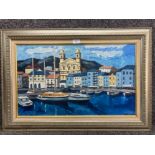 An oil painting of St Tropez, France indistinctly signed 39 x 64 nicely framed